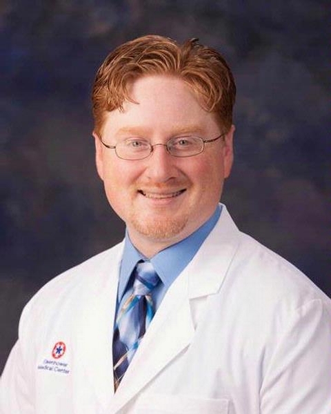 Justin Thomas, MD